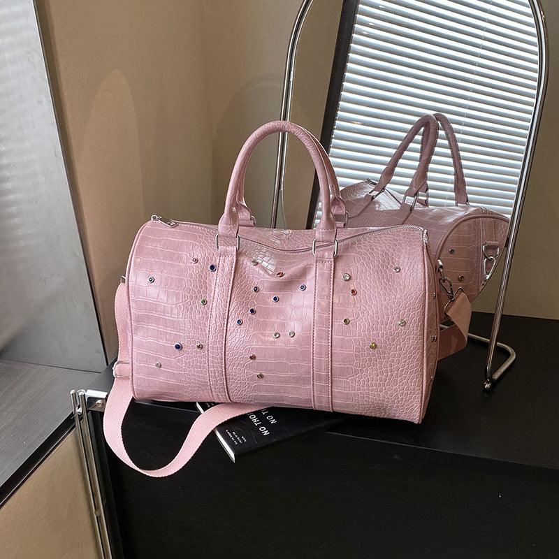 Fashionable travel bag with structured surface and versatile interior Bowlift