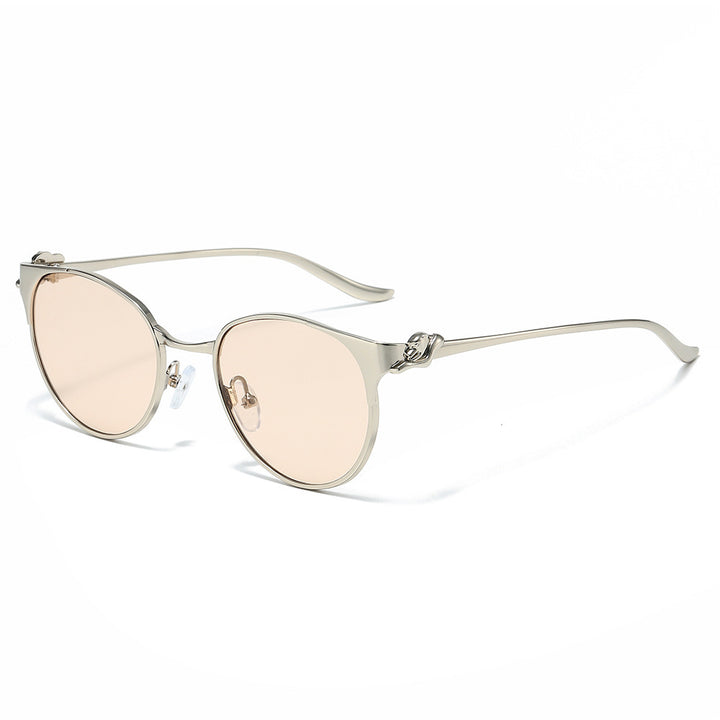 Elegant Cat-Eye Sunglasses with Decorative Gold Accents Bowlift