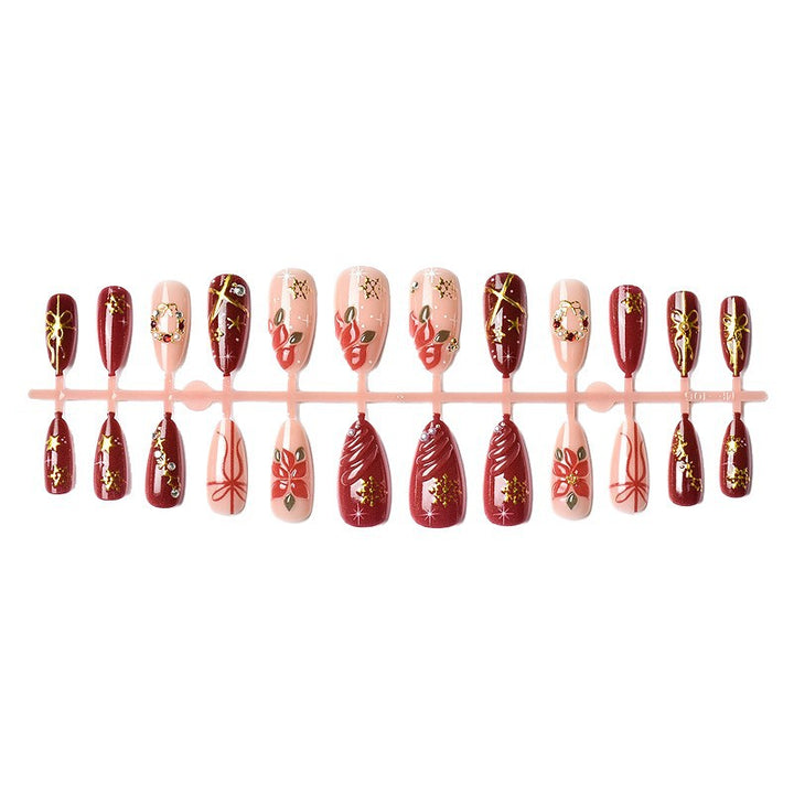 Artificial nail set in festive winter design with glamorous accents Bowlift