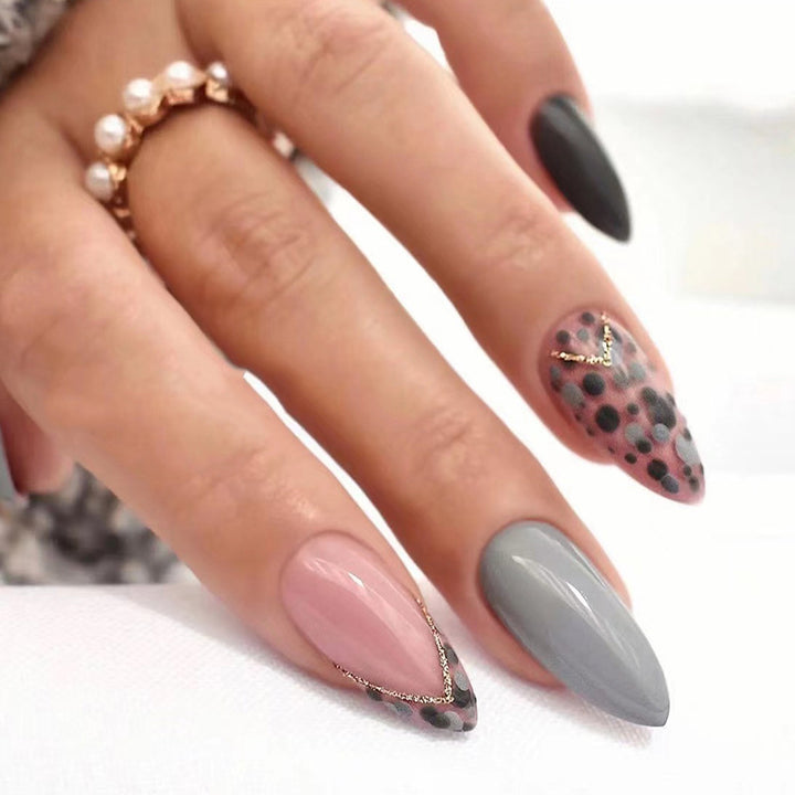 Artful stiletto nails with elegant accent design Bowlift