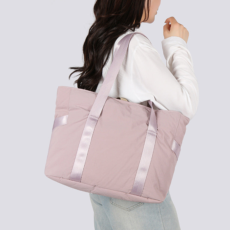 Stylish tote bag with spacious main compartment and reinforced handles Bowlift