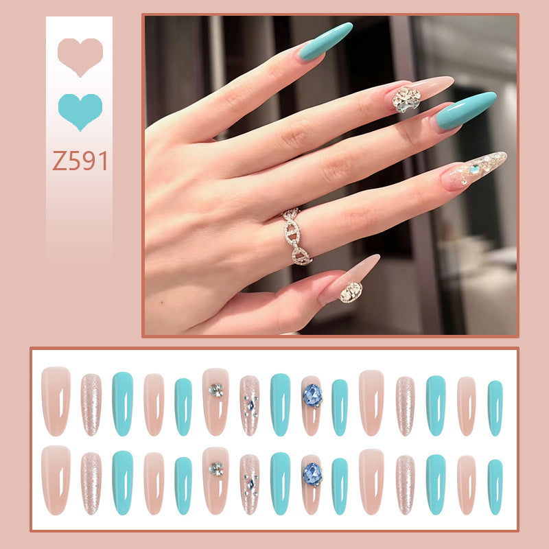 Artificial nail set with glamorous 3D applications and sparkling design Bowlift