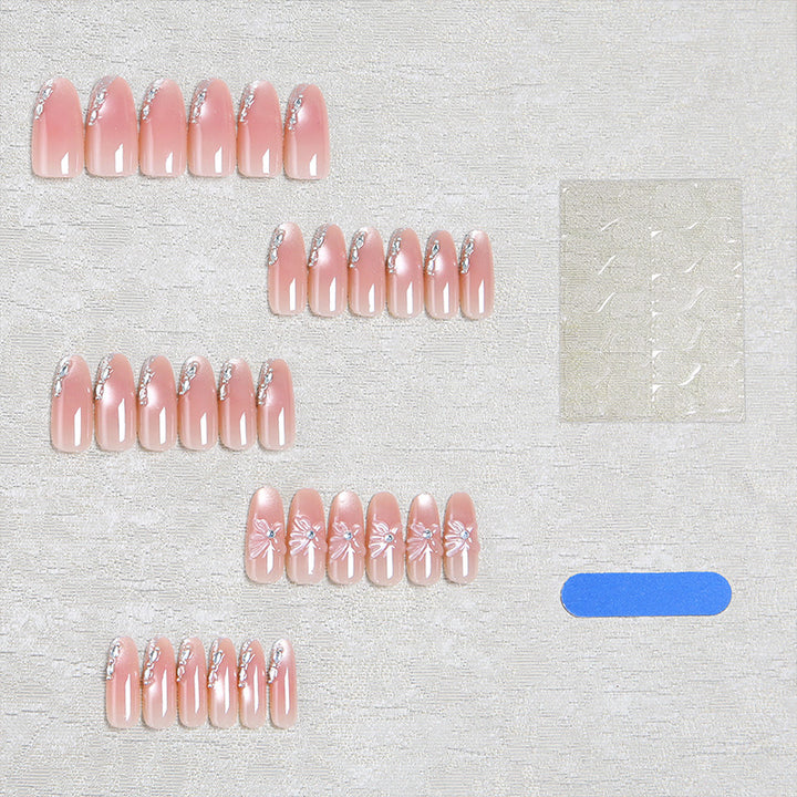 Acrylic nail set with elegant ombre design and sparkling accents Bowlift