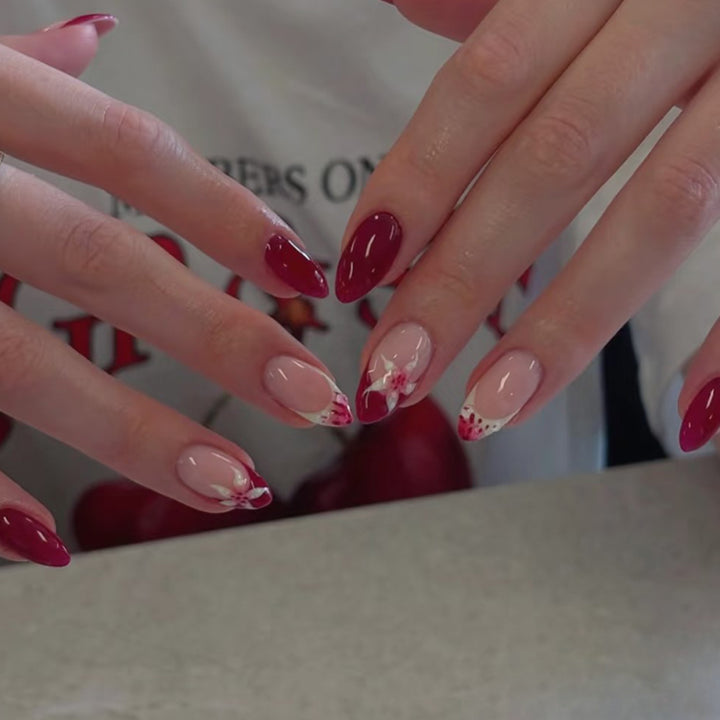 Artistic nail art with floral accents and glossy finish Bowlift