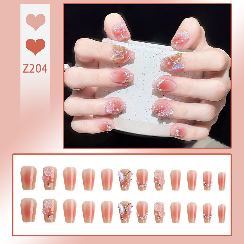 Artificial nail set with filigree 3D flowers and radiant glitter accents Bowlift