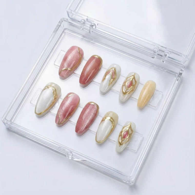 Artificial nails with floral gold accents and glossy finish Bowlift