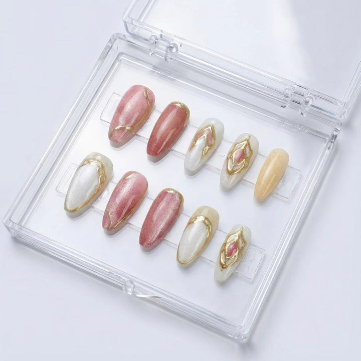 Artificial nails with floral gold accents and glossy finish Bowlift