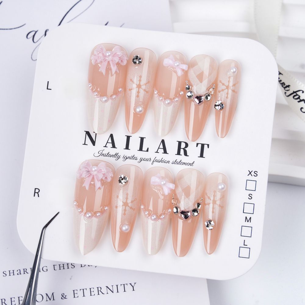 Artistic Stiletto Press-On Nail Set with Floral Embellishments Bowlift