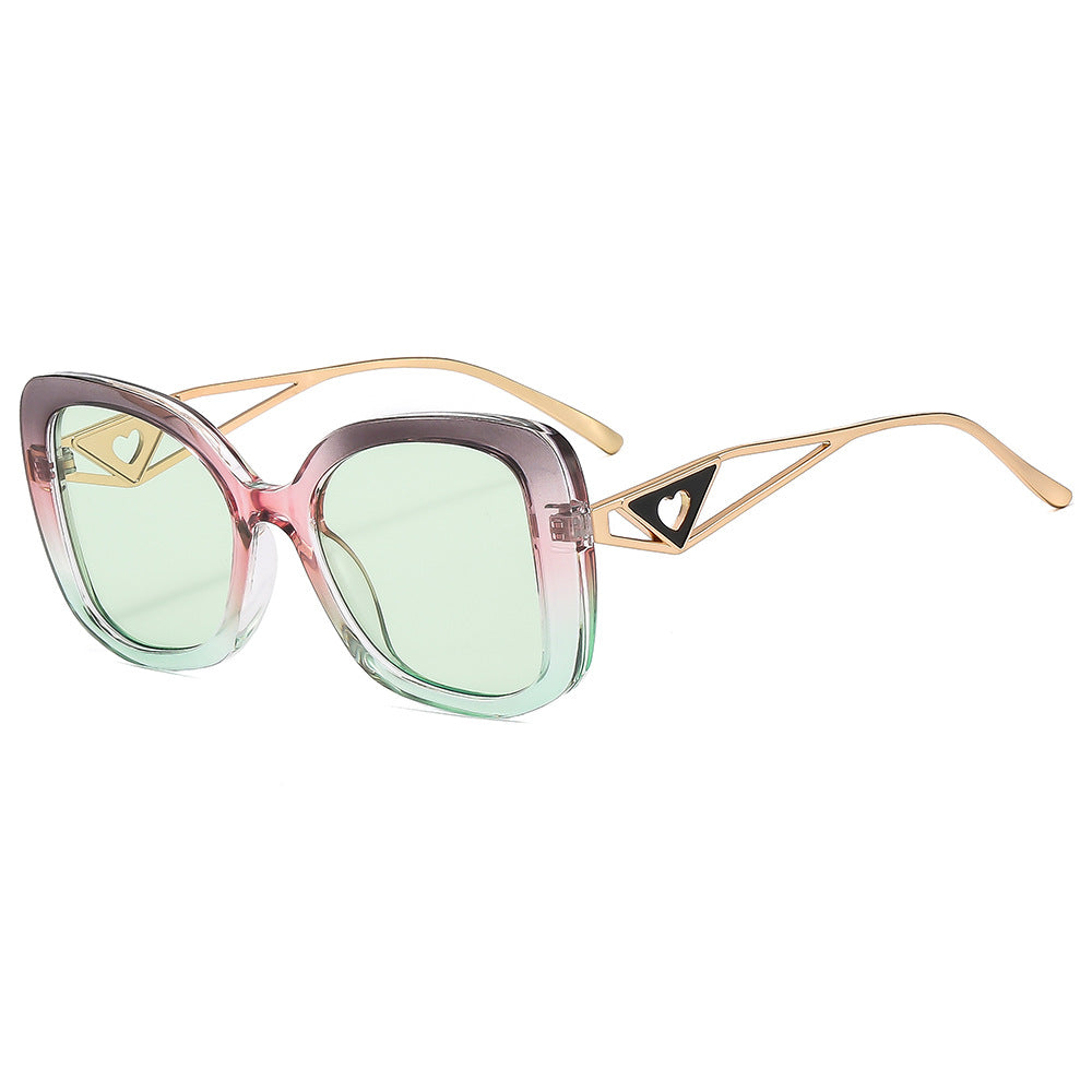 Ladies fashionable oversized sunglasses with luxurious heart detail Bowlift