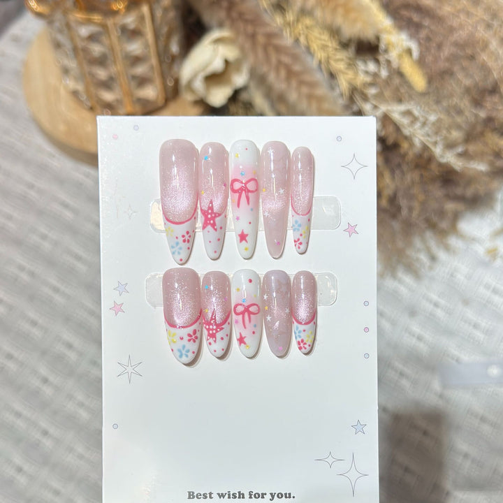Artistic Press-On Nail Art Set with Charming Star and Bow Designs Bowlift