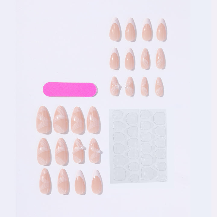 Creative acrylic nail set with elegant tips and glitter decorations Bowlift