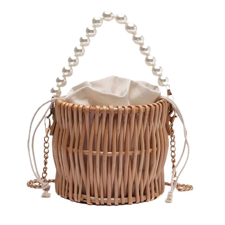 Women’s handbag with elegant pearl handle and braided design Bowlift