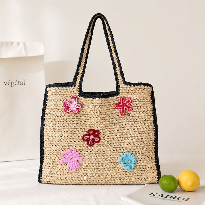 Handmade straw bag with flower appliqués Bowlift