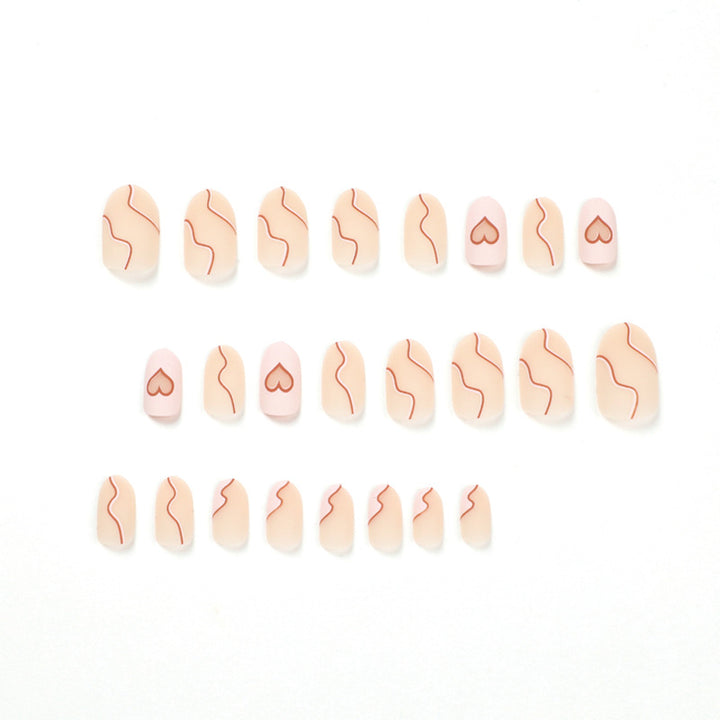 Artful Nail Extensions with Elegant Heart Design Bowlift