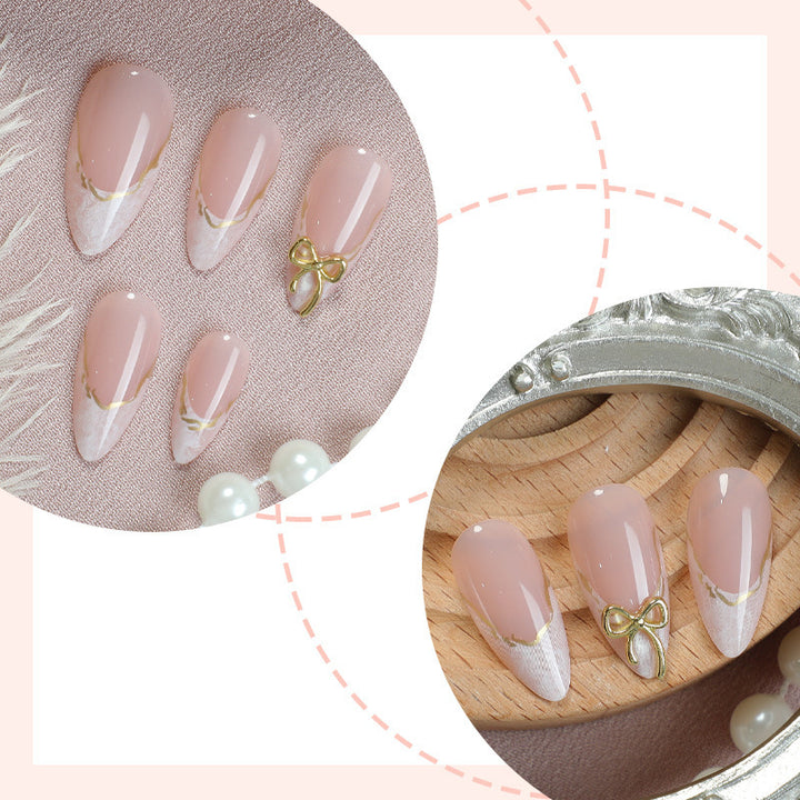 Artistic Nail Tips with Golden Accents Bowlift