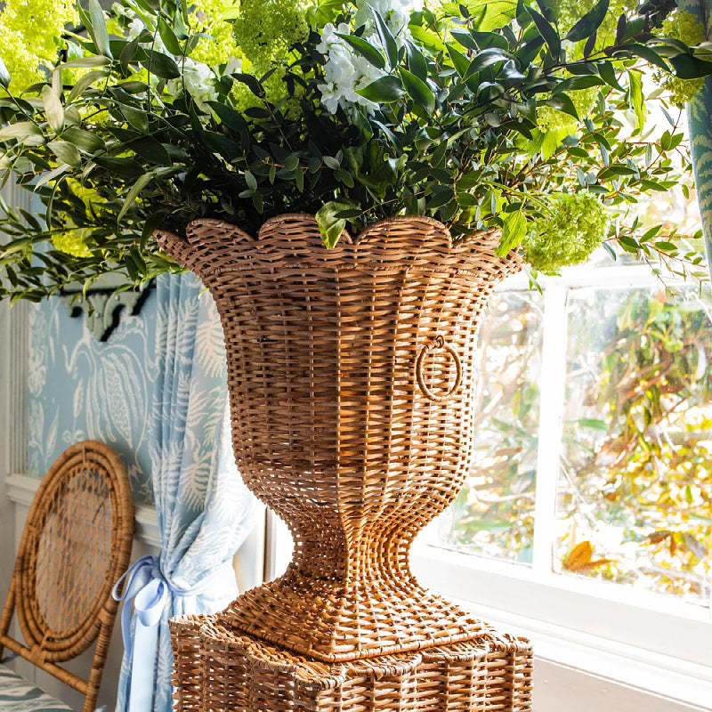 Decorative plant pot stand made of woven material Bowlift