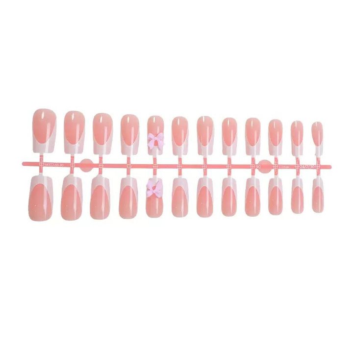 Nail set with playful bow design Bowlift
