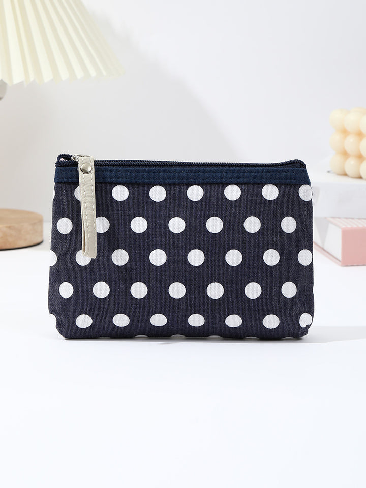 Polka dot canvas cosmetic pouch with top zipper and leather pull Bowlift