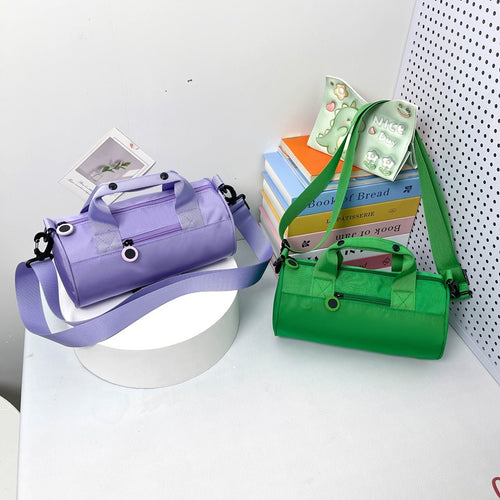 Sporty Mini-Duffel Bag with Adjustable Shoulder Strap and Sturdy Carry Handles Bowlift