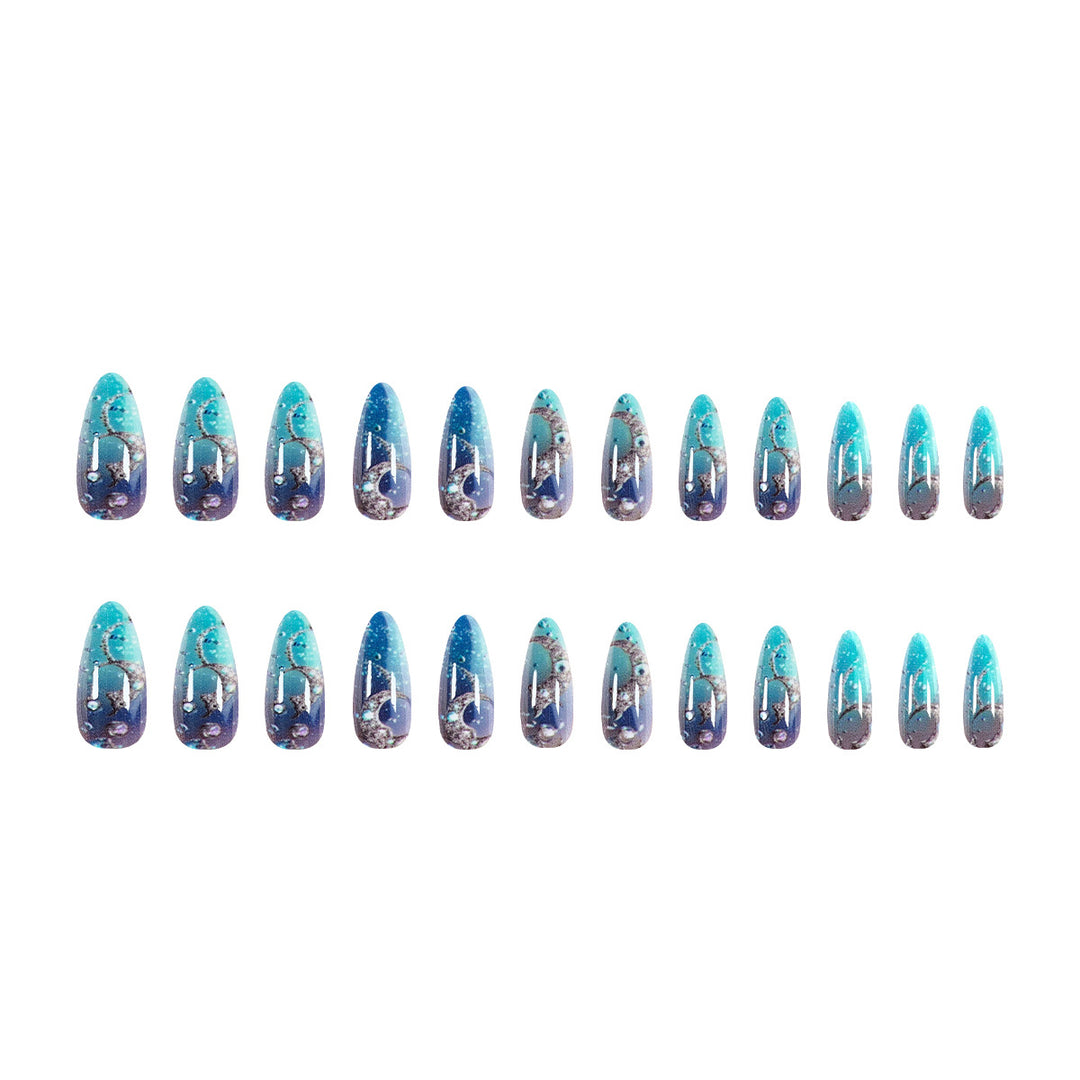 Artistic stiletto nails with glitter and marine motifs Bowlift