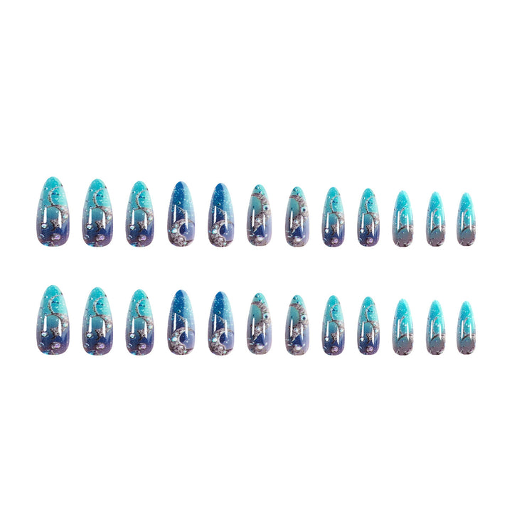 Artistic stiletto nails with glitter and marine motifs Bowlift