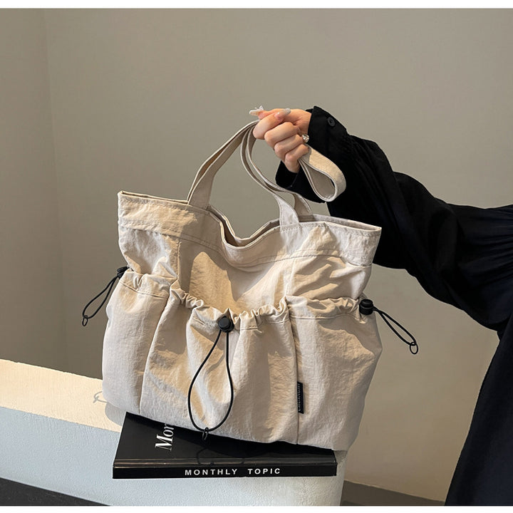 Practical everyday handbag with drawstring Bowlift