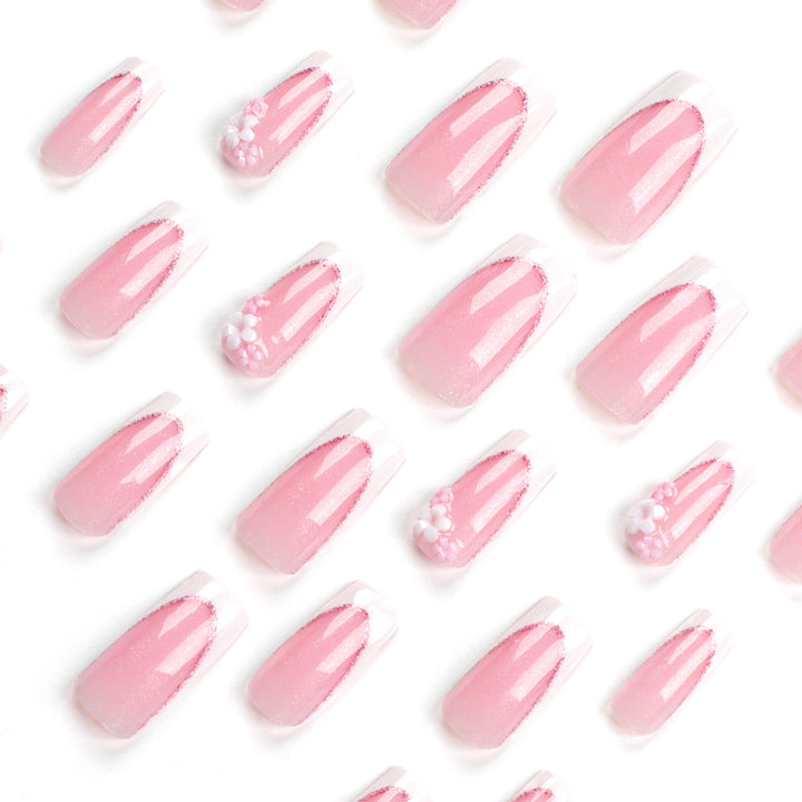 Artful Nail Extensions with Glitter and Flower Accents Bowlift