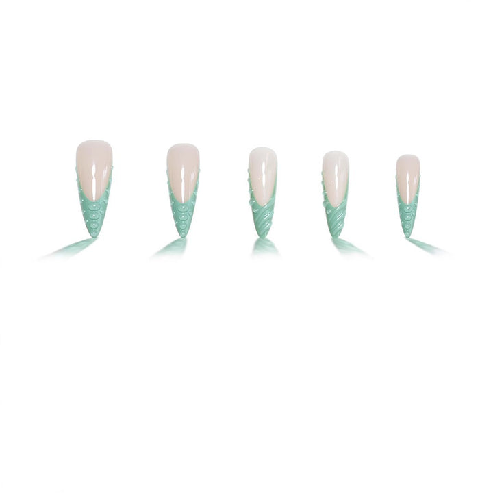 Artistic Stiletto Press-On Nail Design with 3D Shell Accents Bowlift