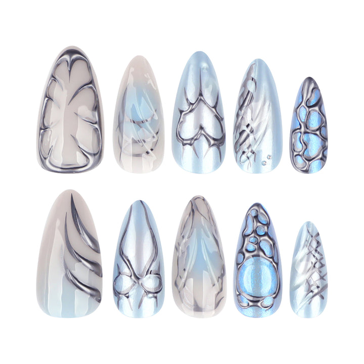 Artful stiletto nails with playful metallic details Bowlift