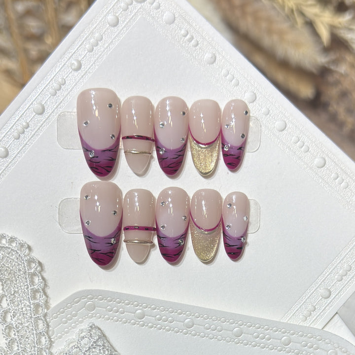 Artistic Stiletto Press-On Nail Set with Rhinestone Accents Bowlift