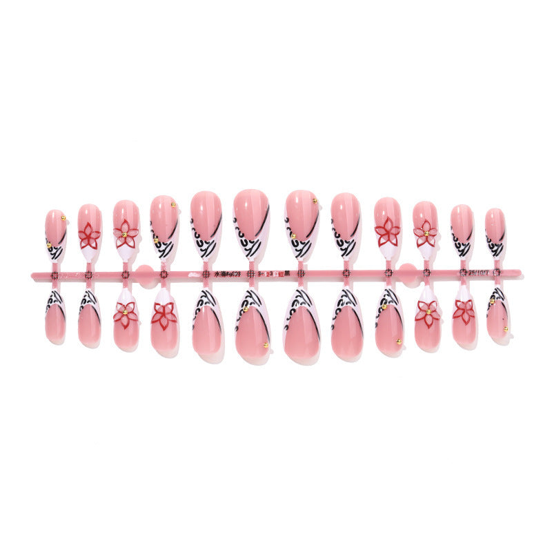 Artificial nail set with elegant ribbon and flower embellishments Bowlift