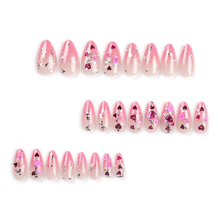 Artful nail art with playful heart designs and glitter Bowlift