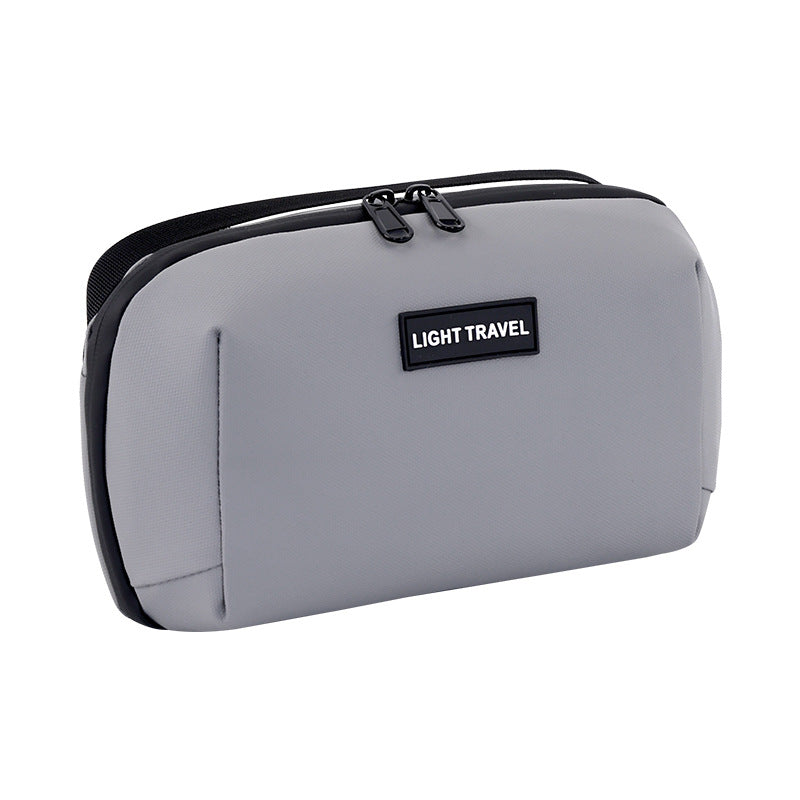 Cosmetic-transport bag with practical zipper and multifunctional interior Bowlift