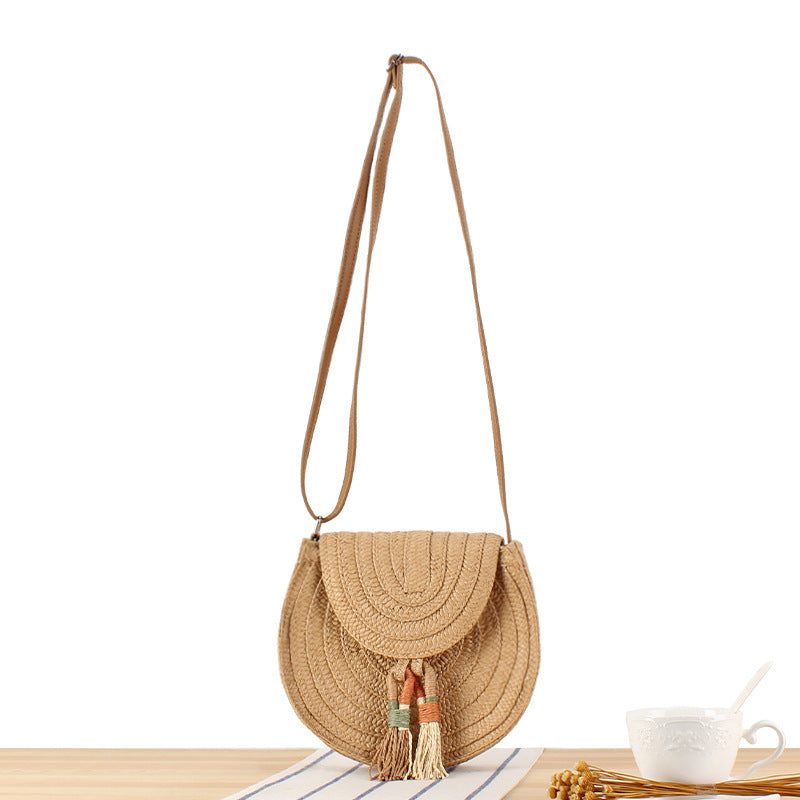 Round Bast Crossbody Bag with Tassels by Bowlift