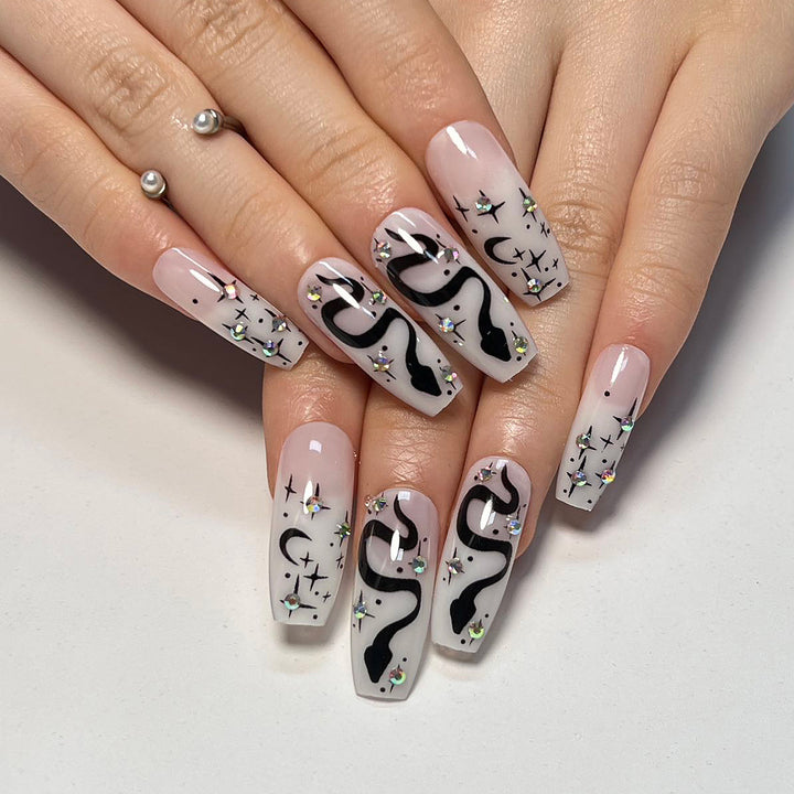 Artful gel nails with elegant 3D design and glitter accents Bowlift