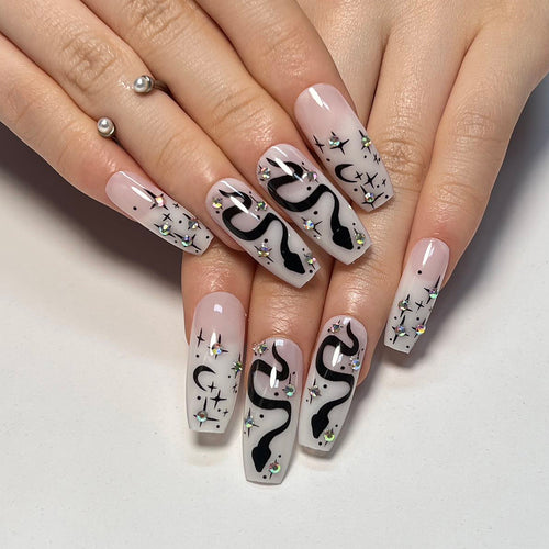 Artful gel nails with elegant 3D design and glitter accents Bowlift
