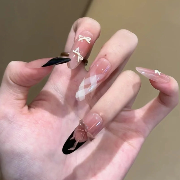 Glamorous artificial nails with creative embellishments Bowlift