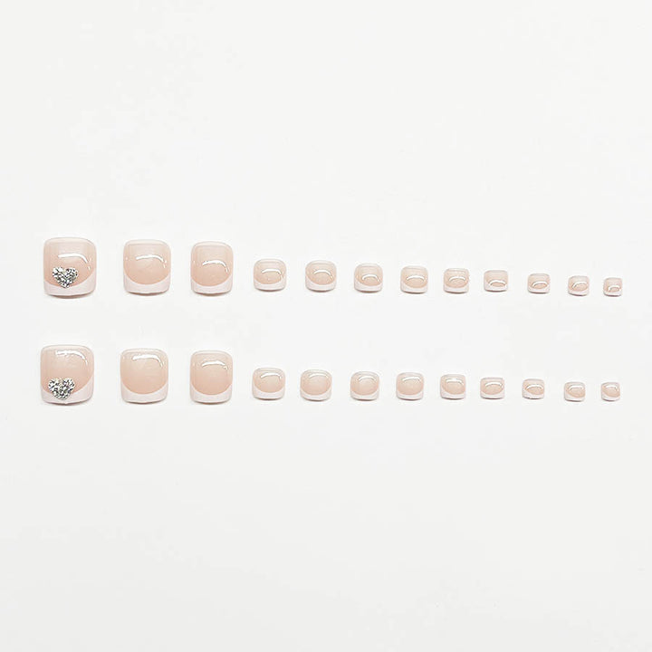 Artifical nail set with glamorous heart design and elegant French tip Bowlift
