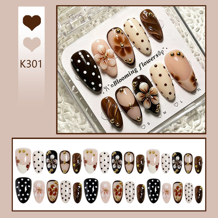 Art nail set with floral accents and elegant 3D decorations Bowlift