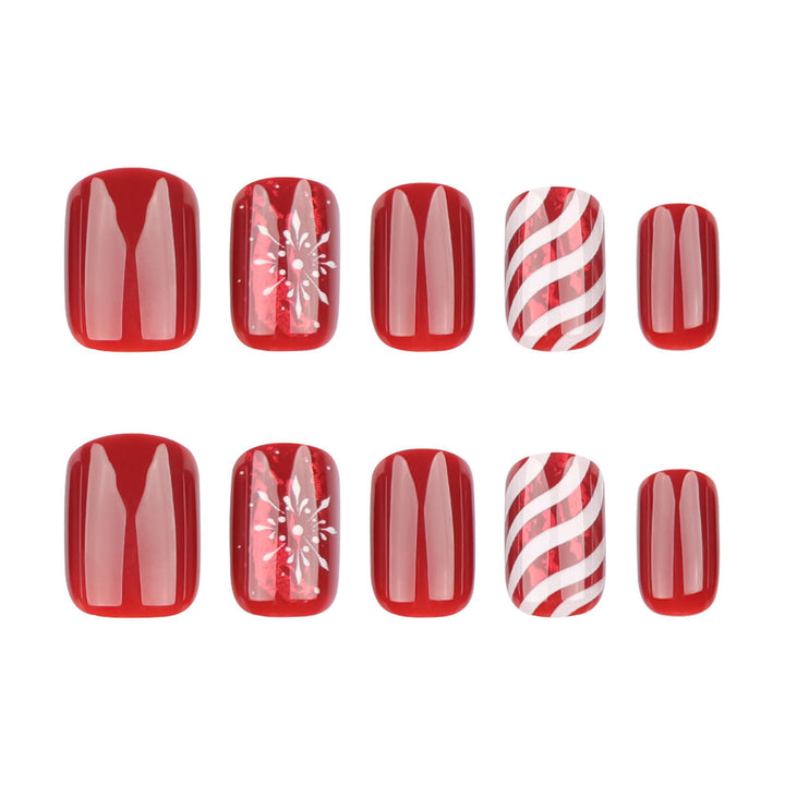 Artificial nail set with festive designs and glitter accents Bowlift