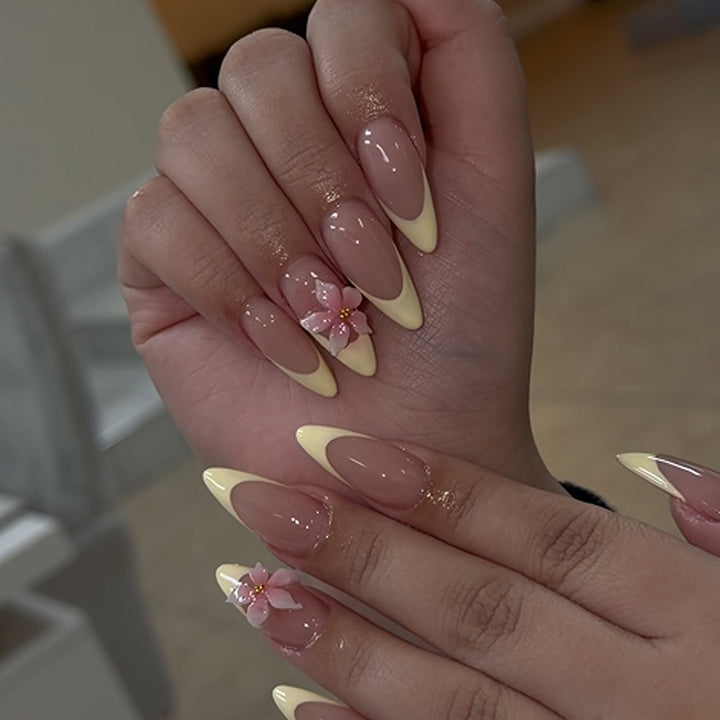 Artful stiletto nails with elegant flower accent Bowlift
