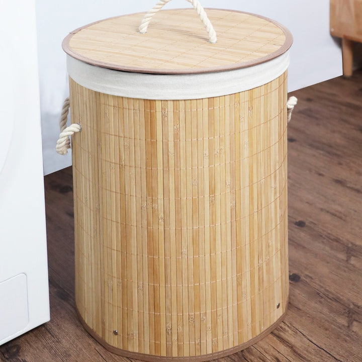 Stylish laundry container with practical lid and carrying handles Bowlift
