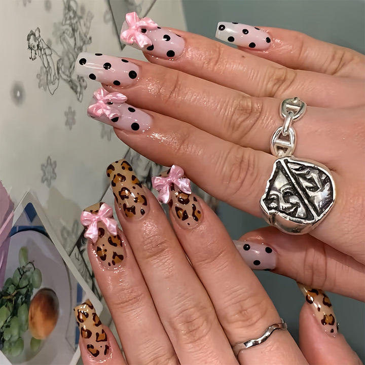 Creative artificial nails with bows and dots Bowlift