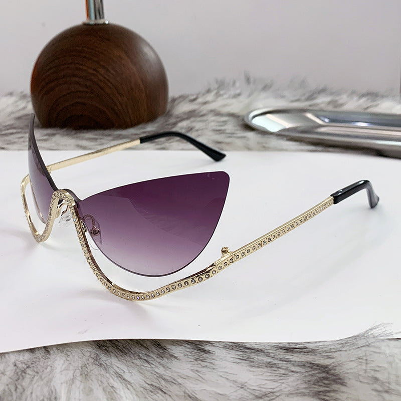 Women's extravagantly shaped Cat-Eye sunglasses with sparkling appliqués Bowlift