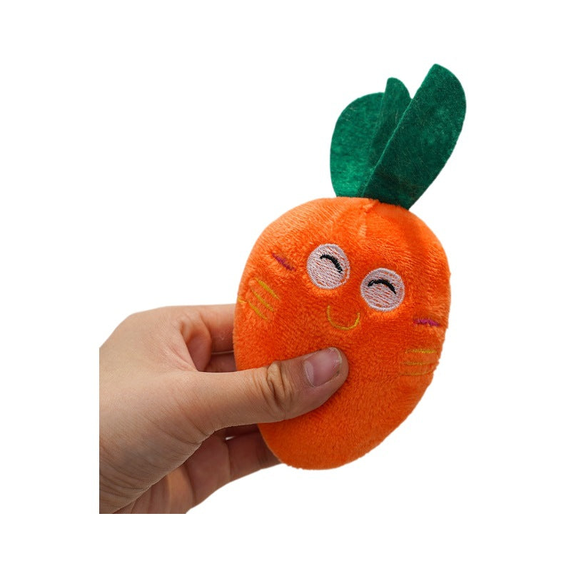 Plush carrot catnip toy for cats with embroidered smiling face and double leaf topper Bowlift