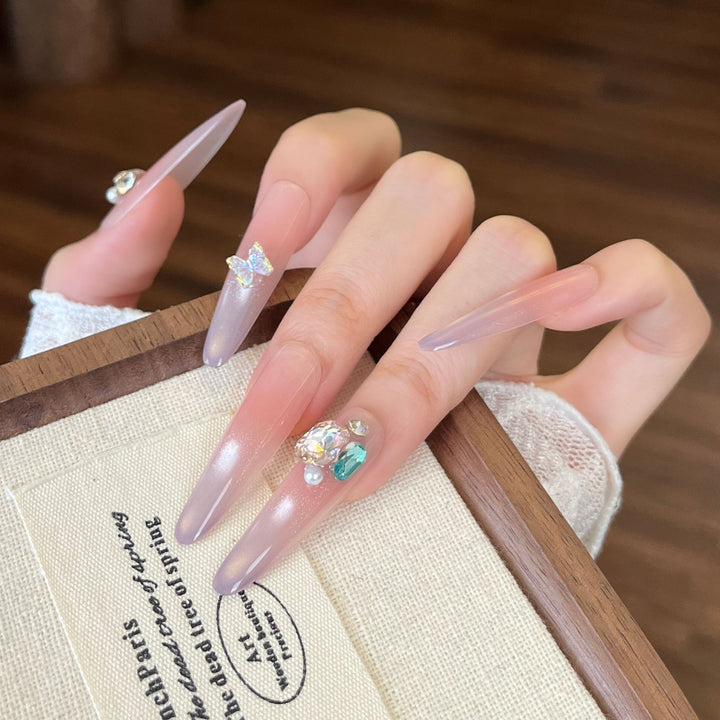 Artistic Nail Design with Decorative Elements Bowlift