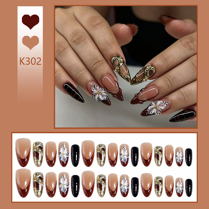 Artificial nail set with extravagant 3D design and elegant embellishments Bowlift