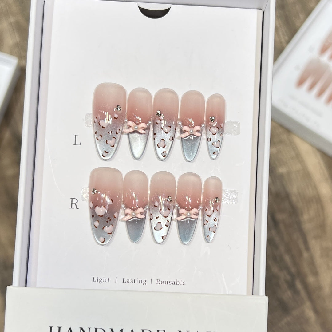 Decorative Press-On Nail Design with Bow Accents Bowlift