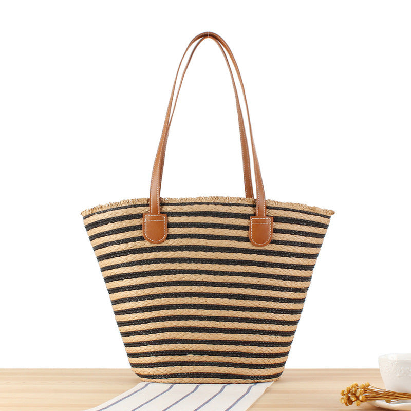 Braided beach bag with modern stripes and sturdy handles Bowlift