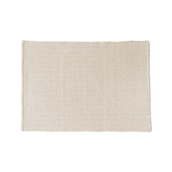 Woven placemat made of cotton blend with waffle texture
